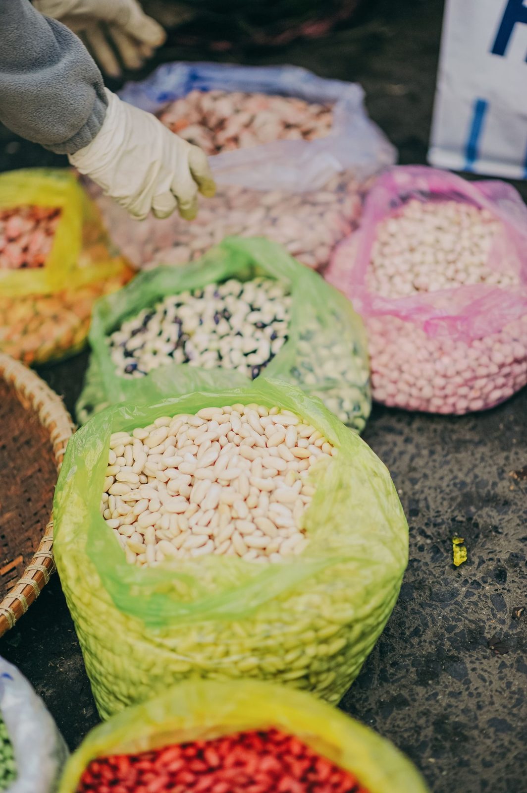 Sacks of assorted beans and pulses at a market